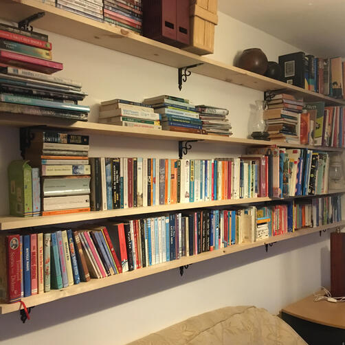 Shelving with ornate brackets Shelving with ornate brackets