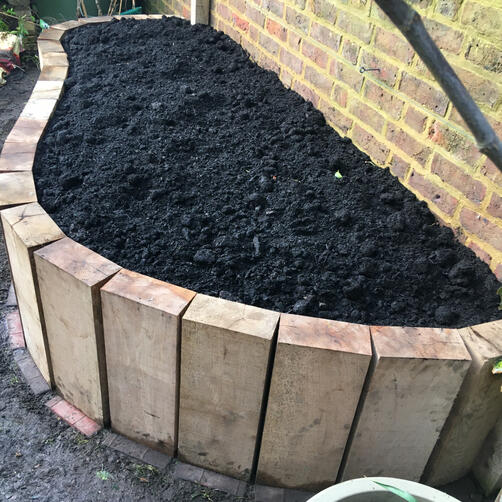 Raised oak sleeper bed